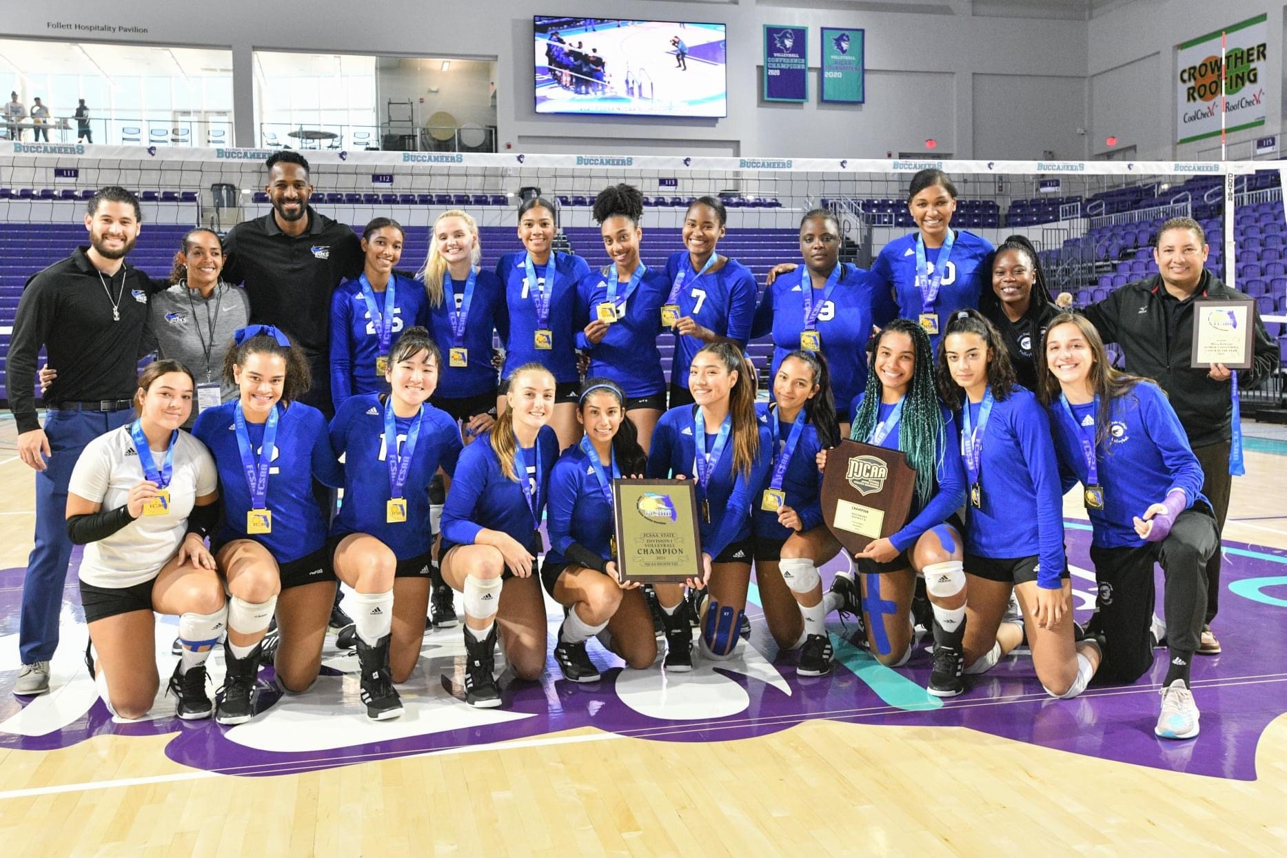 Photo: MDC Lady Sharks volleyball team and coaches with their state championship trophies and medals.